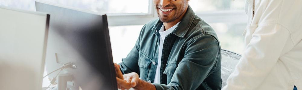 People collaborating on computer