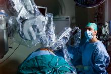 Robot assisting surgeon