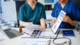 Healthcare workers using tablet