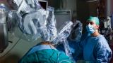 Robot assisting surgeon