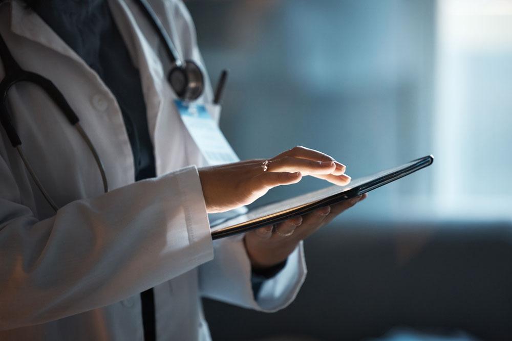 Doctor using tablet