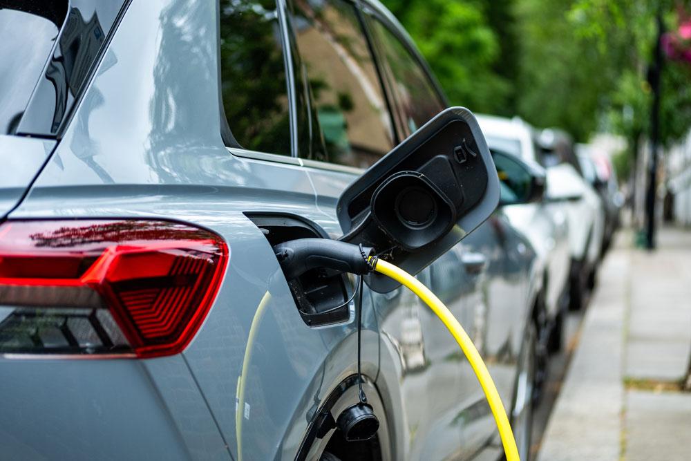 charging car on residential street in London